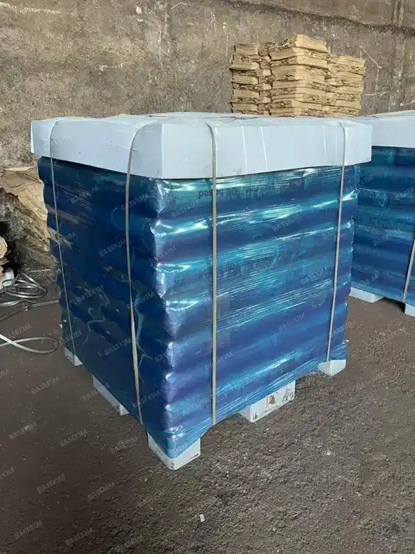 Rows of palletized gilsonite in the loading yard