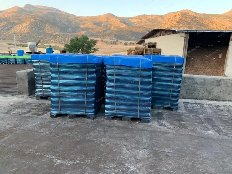 Rows of palletized gilsonite in the loading yard