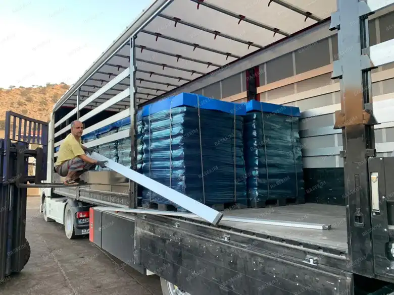 Flatbed truck loaded with gilsonite pallets