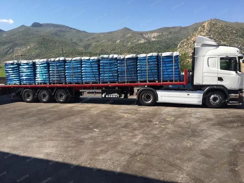 Gilsonite shipment strapped on a trailer