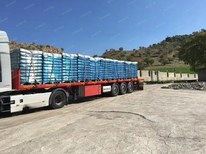 Truck loading of 25 kg gilsonite bags – asphalt application