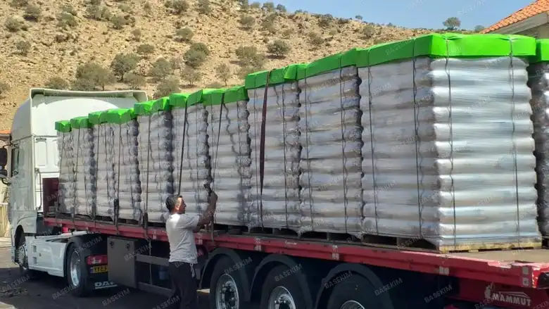 Trailer of palletized gilsonite leaving the plant – asphalt application