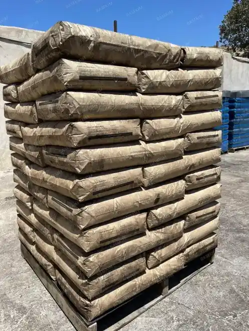Multi-wall kraft bags of asphaltic mud additive