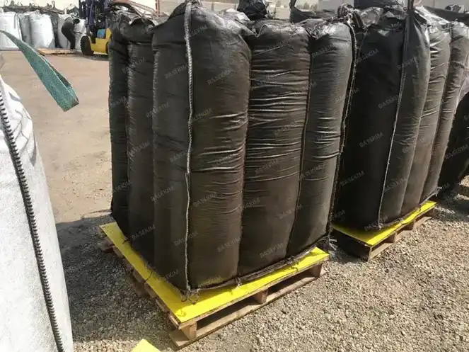 Jumbo bags of natural asphalt on pallets