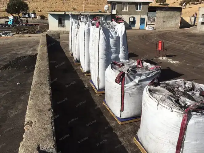 Jumbo bags of natural asphalt on pallets