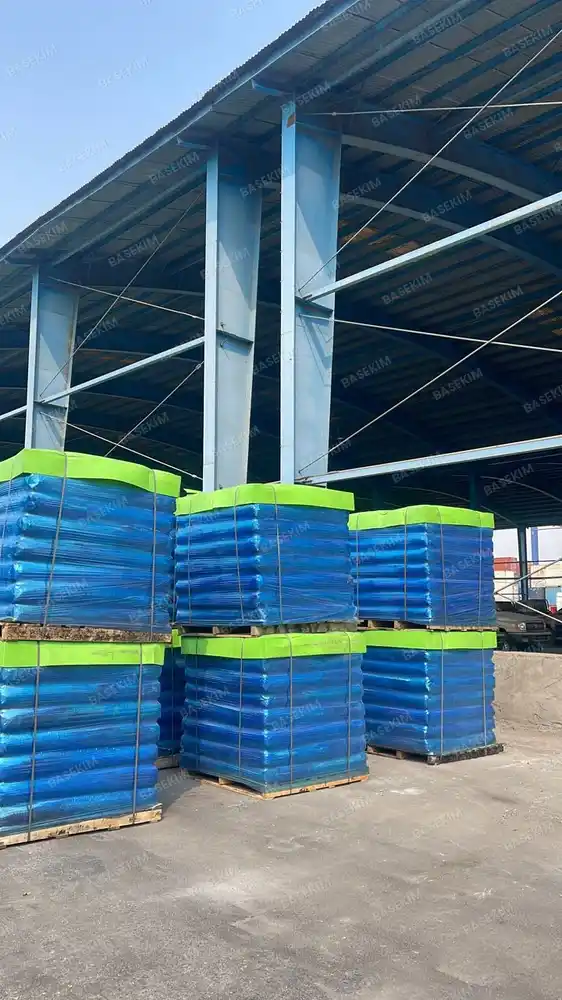 Rows of palletized gilsonite in the loading yard